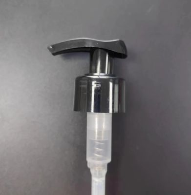 مضخة مستودع المستودع البلاستيكي الجديد الحق يسار القفل مستودع مستودع المستودع للزجاجة